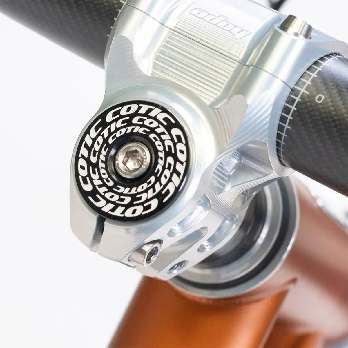 Our headset top caps, with rotating concentric COTIC logos., 